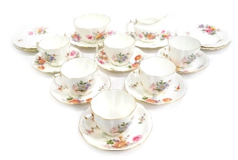 A Royal Crown Derby Porcelain Derby Posies part tea service, comprising six cups and saucers, a milk jug, a sugar bowl, and six side plates.