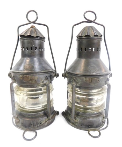 Two Nauticalia shipping lanterns, 26cm high.