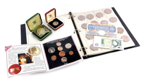 A Collecta coin album, enclosing pre decimal coinage, pennies and half pennies, two shillings, etc., a commemorative crown, a small group of first day covers, and a collector's fifty pence piece, boxed. (a quantity)