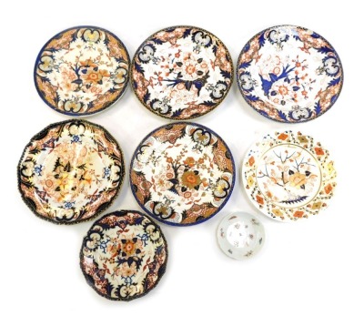 A group of 19thC Royal Crown Derby Imari porcelain plates, and other plates, all heavily restored. (AF)