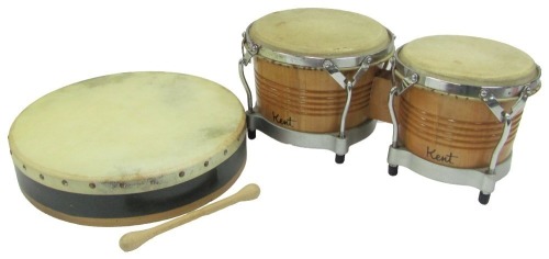 A pair of Kent bongos, and a Bodhran with an instruction booklet. (2)