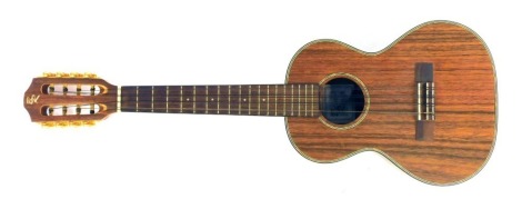 A Taropatch tenor ukelele, model U5T8, 68cm high.