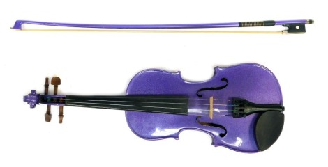 A half size student violin, The Harlequin, in purple glitter finish, with bow, in soft shell carry case.