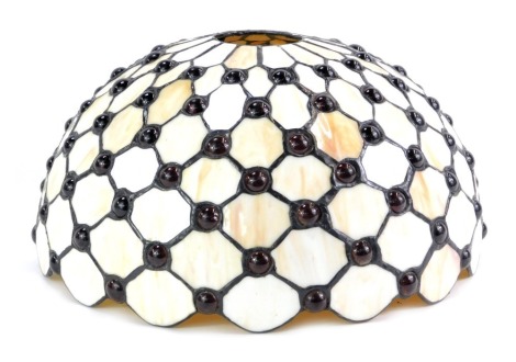 A Tiffany style cream light shade, with shaped panels and cabochon red beaded detail, 29cm diameter.