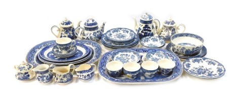 A group of Wedgwood and other blue and white wares, including two meat plates, three teapots, a coffee pot, five cups, four saucers, a sugar bowl, three milk jugs, three oval serving plates, two breakfast bowls, two dessert bowls, four side plates and an 