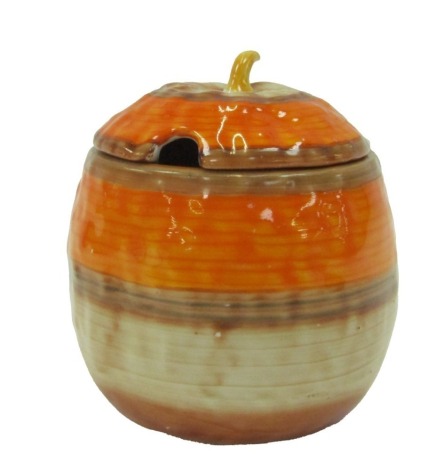 A Shelley preserve jar and cover, orange and brown banded, stamped Shelley, 12cm high.