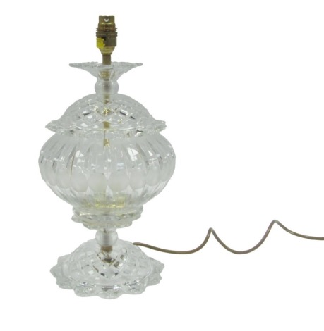 A cut glass pineapple shaped table lamp, with lotus flower top and base, 42cm high.