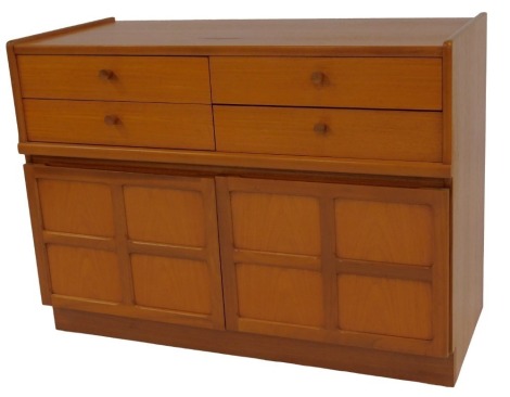 A Nathan teak side cabinet, the top with an arrangement of four drawers above two panelled cupboards, on plinth base, 76cm high, 103cm wide, 44cm deep.