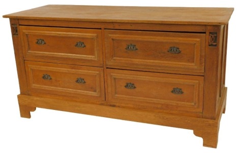 A 20thC Continental oak chest, of four deep drawers with moulding, carved motifs to each side, on bracket feet, 95.5cm high, 183cm wide, 72cm deep.