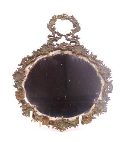 A 19thC cast metal framed hand mirror, with central bevelled mirror plate surrounded by a frame cast with scrolls and leaves, with handle, possibly formally had a strut back support, 23cm high.