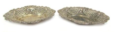 A pair of Elizabeth II silver bonbon dishes, embossed floral foliate scroll decoration, Sheffield 1968, 5.39oz.