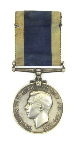 A George VI Naval Long Service and Good Conduct medal, named to J Osbourne, S.P.O. HMS Pembroke, K4422.