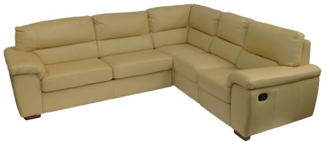 A cream leather electric corner sofa, with integral double sofa bed. The upholstery in this lot does not comply with the 1988 (Fire & Fire Furnishing) Regulations, unless sold to a known exporter or upholsterer it will be cut from the frame before leaving