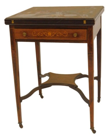 A late 19thC and rosewood inlaid envelope card table, the top with boxwood floral and scroll decoration, enclosing a green baize interior with four recesses, the base with frieze drawer on square tapering legs on castors united by an under tier, 75cm high