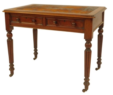 A Victorian mahogany writing table, the rectangular top with a rounded edge inset with a brown leather panel, above two frieze drawers, on fluted cylindrical legs on castors, 71cm high, 91cm wide, 61cm deep.