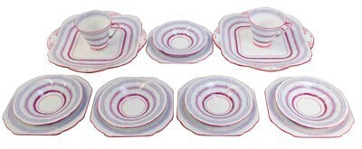 A group of Lawley's Norfolk pottery Ruffles pattern teawares, in pink and purple colourway, comprising two cups, five saucers, five sandwich plates and two serving plates.