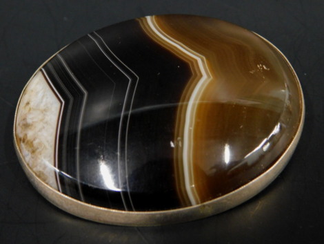 A silver and agate set brooch