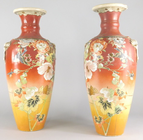 A pair of late 19th/early 20thC Japanese earthenware vases