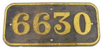 A locomotive or engine plaque, numbered 6630, stamped Engine Class T062 A30, Boiler Class BA, 64cm wide.