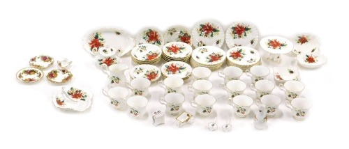 A large quantity of Royal Albert Poinsettia pattern teaware, etc.