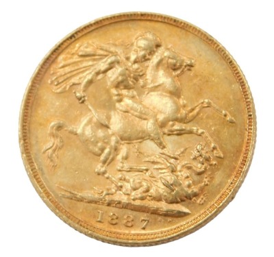 A Queen Victoria full gold sovereign, dated 1887.