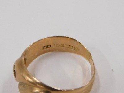 A 9ct rose gold snake ring, the cross over head, lacking stones, maker T&S, Chester 1929, ring size V, 5.6g. - 2