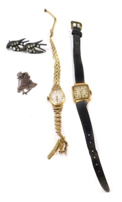 Two wristwatches, silver chain and brooch, comprising a Victoria 18ct gold lady's wristwatch, on black leather strap, a 9ct gold Rotary lady's wristwatch, 18.9g all in, and a small group of costume jewellery. (a quantity)