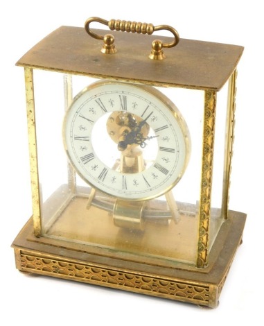 A German Kieninger and Obergfell magnetic pendulum electric mantel clock, in gilt brass case, 23cm high.