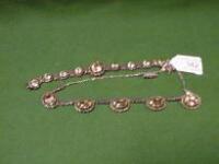 A white metal bracelet and necklace set with marcasite and champagne coloured