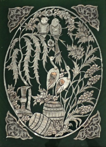 Eastern School. A cut silver plated frame, of oval form with herrings and birds, and floral border, with inlaid bone and hammered frame, 40cm x 28cm. (AF)