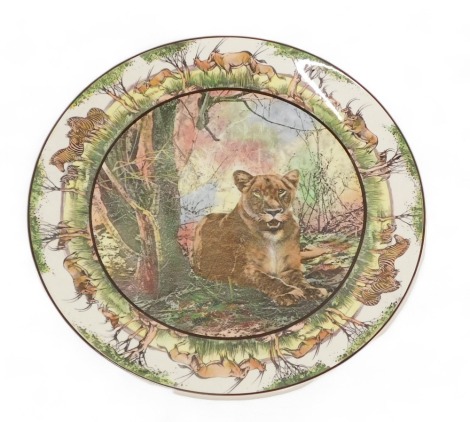 A large Royal Doulton African series Lioness pattern charger, 34cm diameter.