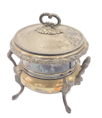 A late 19th/early 20thC silver plated circular tureen and cover, with a fluted and shelled border, on four outsplayed legs, 23cm high.