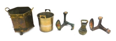 A copper and brass two handled jardiniere or coal box, two shoe lasts, and a large brass bell shaped weight.