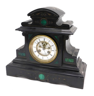 A French black slate and malachite mantel clock, of architectural form, 35cm high.