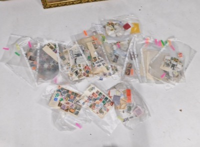 A quantity of world stamps, to include mid 20thC Stanley Gibbons book, loose stamps, etc. - 2