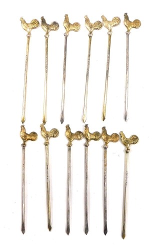 A set of twelve cockerel cocktail sticks, each white metal, in fitted case, 1.10oz, boxed.