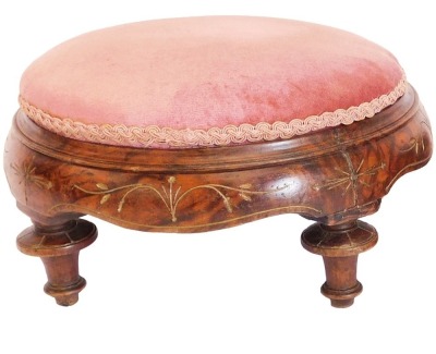 A Victorian walnut and parcel gilt circular footstool, with pink padded top, 30cm diameter.