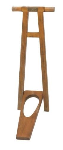 A 20thC beech boot jack, with presentation plaque David Butler from The Butler Boys, 80cm high.