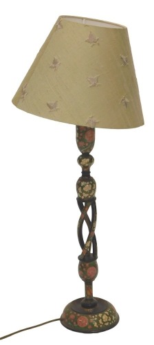 A 20thC painted Damascusware table lamp, with pierced column and domed base, decorated overall with flowers and leaves, etc., 50cm high.