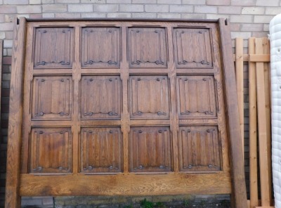 An oak half tester bed, with turned front post carved with flower heads, leaves, etc., the headboard carved with linen fold, etc., sold with ziplock mattress, 185cm wide. - 3