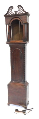 A late 18th/early 19thC mahogany longcase clock case, with later fret work swan neck pediment, above an arched door to the trunk, flanked by blind fret, canted corners, on bracket feet, 225cm high.