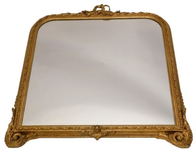 A 19thC gilt gesso overmantel mirror, on arched plate, the frame decorated with leaves, ribbons, etc., 92cm high, 86cm wide.