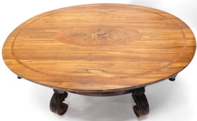 A 19thC rosewood and marquetry centre table, the oval top inlaid with a spray of flowers and leaves, the frieze with turned finials, on shaped leaf and flower carved supports with oval stretcher, 72.5cm high, 61cm wide and 114cm deep. - 2