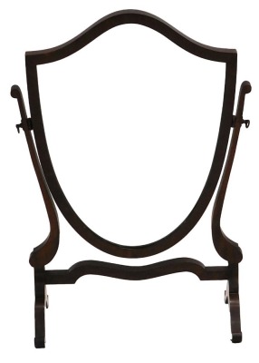 A mahogany shield shaped dressing table mirror, on shaped supports, 60cm high, 42cm wide.