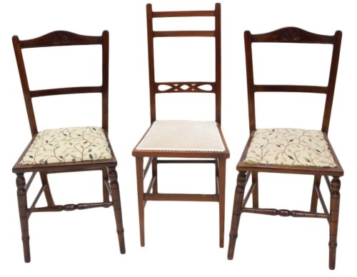 A pair of Edwardian bedroom chairs, each upholstered in cream fabric and another chair. (3) 