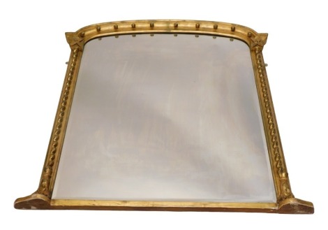 A 19thC gilt framed overmantel mirror, the arched top with beaded and twist stems, with star base and arched top, 120cm high, 108cm wide, 5.5cm deep.