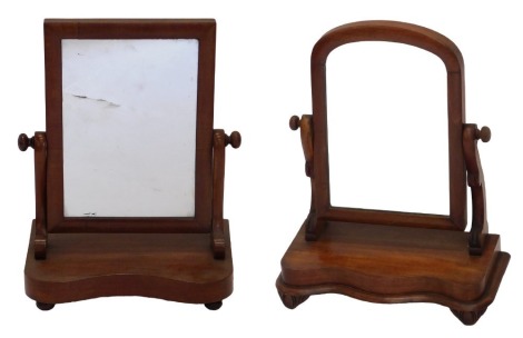 Two Victorian mahogany swing frame dressing table mirrors, each on a shaped base, 40cm and 38cm wide respectively.