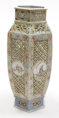 A Qing dynasty late 19thC Chinese famille rose pierced porcelain lantern, of shouldered hexagonal form, with reticulated and painted decoration, having circular reserves with figures, on a floral ground, later converted to a table lamp, bears traces of a - 3