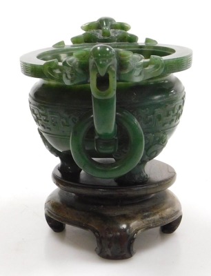 A Chinese spinach jade censer, with twin bird head and ring handles, carved with a band of stylised dragons, raised on three dog of fo shaped feet, boxed, 15.5cm wide. - 2