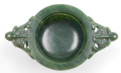 A Chinese spinach jade censer, with twin bird head and ring handles, carved with a band of stylised dragons, raised on three dog of fo shaped feet, boxed, 15.5cm wide. - 5